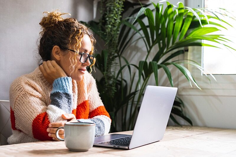 Woman-home-reading-computer Faq